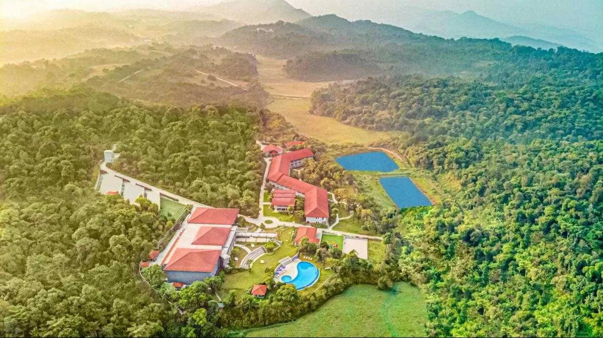 Places to Visit In South India
Coorg
"Coffee Estates and Forest Retreats"
Coorg, often called the...