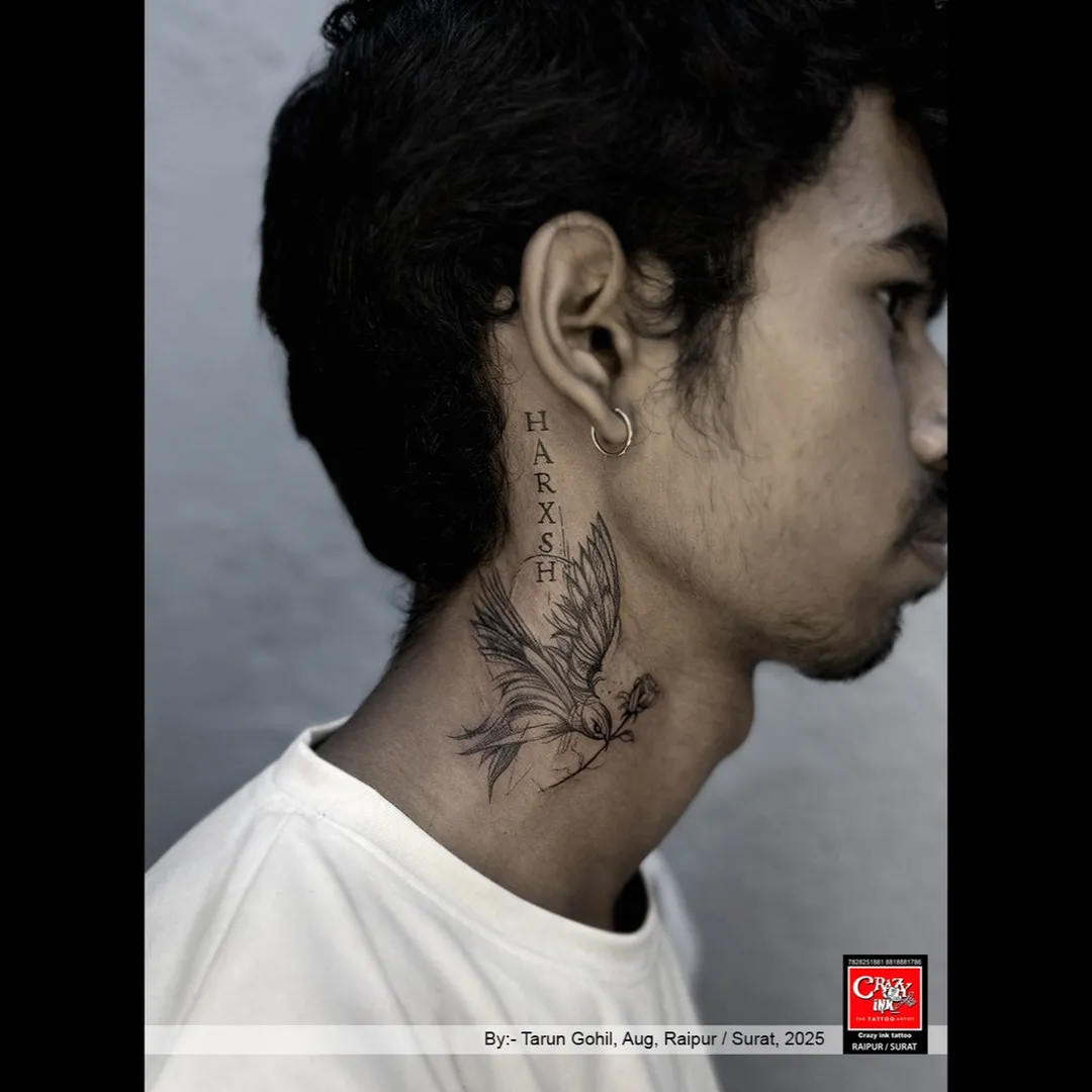 GRACE IN FLIGHT ,STRENGTH IN NAME✨
This elegant neck tattoo beautifully blends symbolism wi...