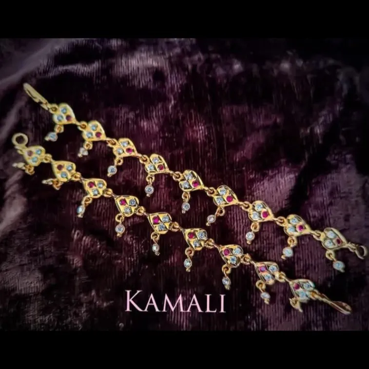 Traditional Impon Kal Maatal
Five Metals Ear Chain
Kamali Queen Heritage Collections
Artificial G...