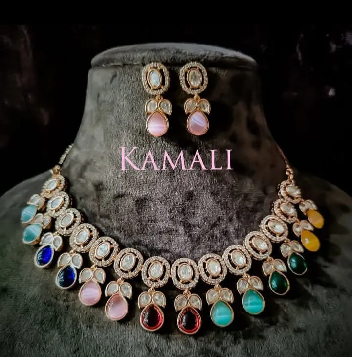 Victorian Mozanite Kundan with multi color stones
Artificial Gold Plated Jewellery
Kamali Queen Ra...