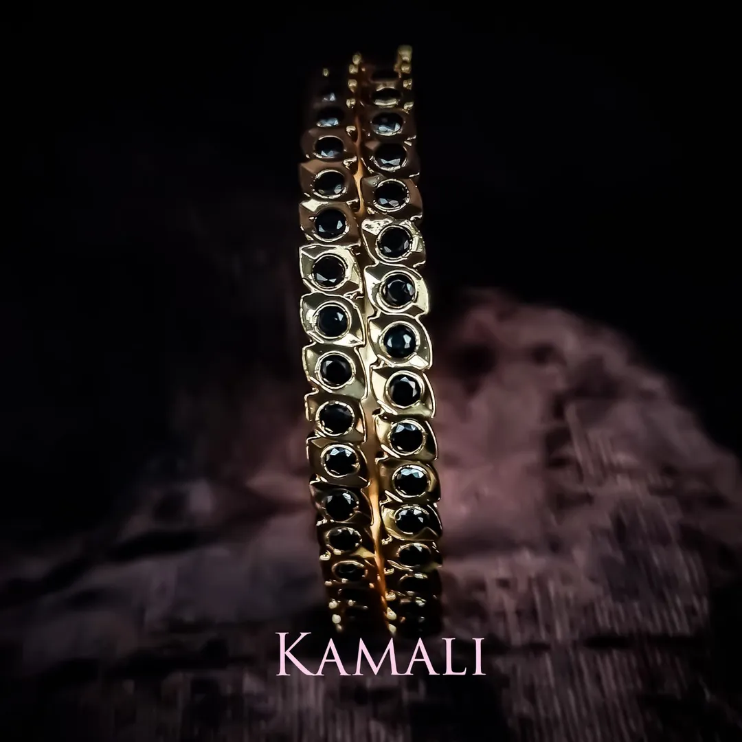 Black Stone Bangles
Stone Setting
Kamali Artificial Gold Plated Impon Jewellers
For full image fo...