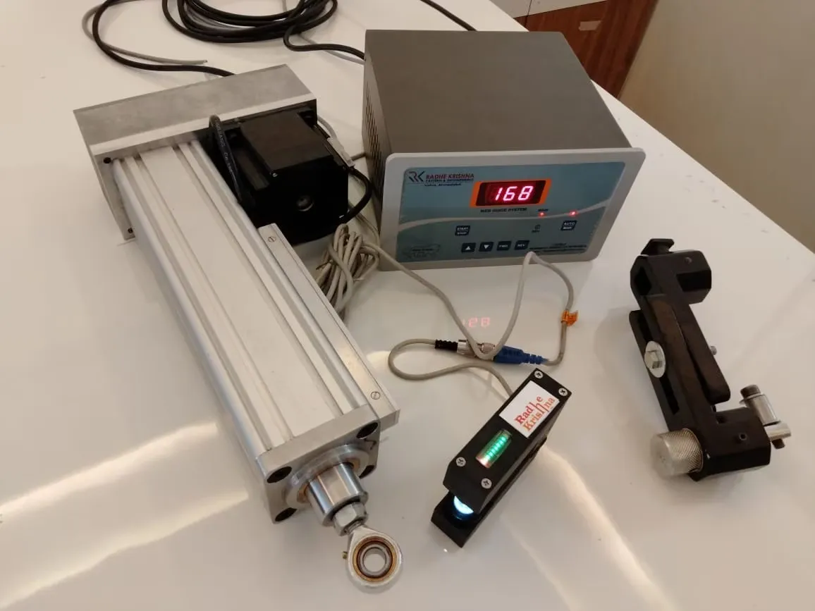 Electric Web Guide System