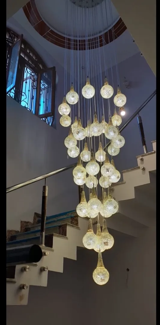 Best Staircase Double Height Chandeliers in Delhi – Premium Designer Chandeliers at Luminarya Lites