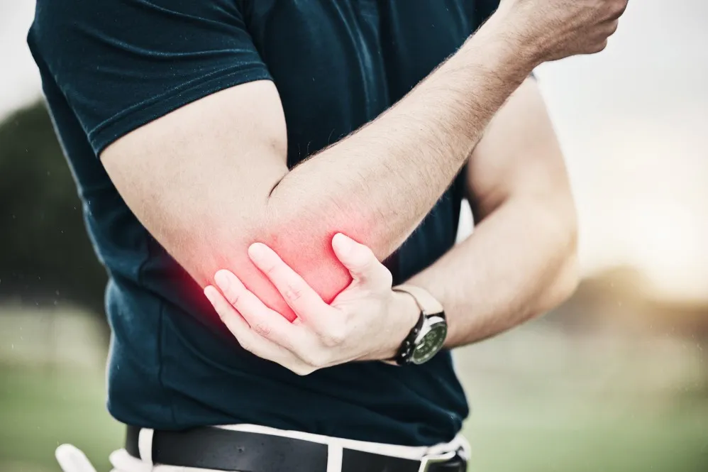 Elbow Pain That Won't Go Away: When Should You See an Elbow Surgeon?