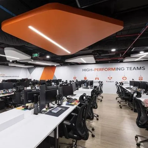 Bold Contemporary Corporate Office with Orange and White Interiors