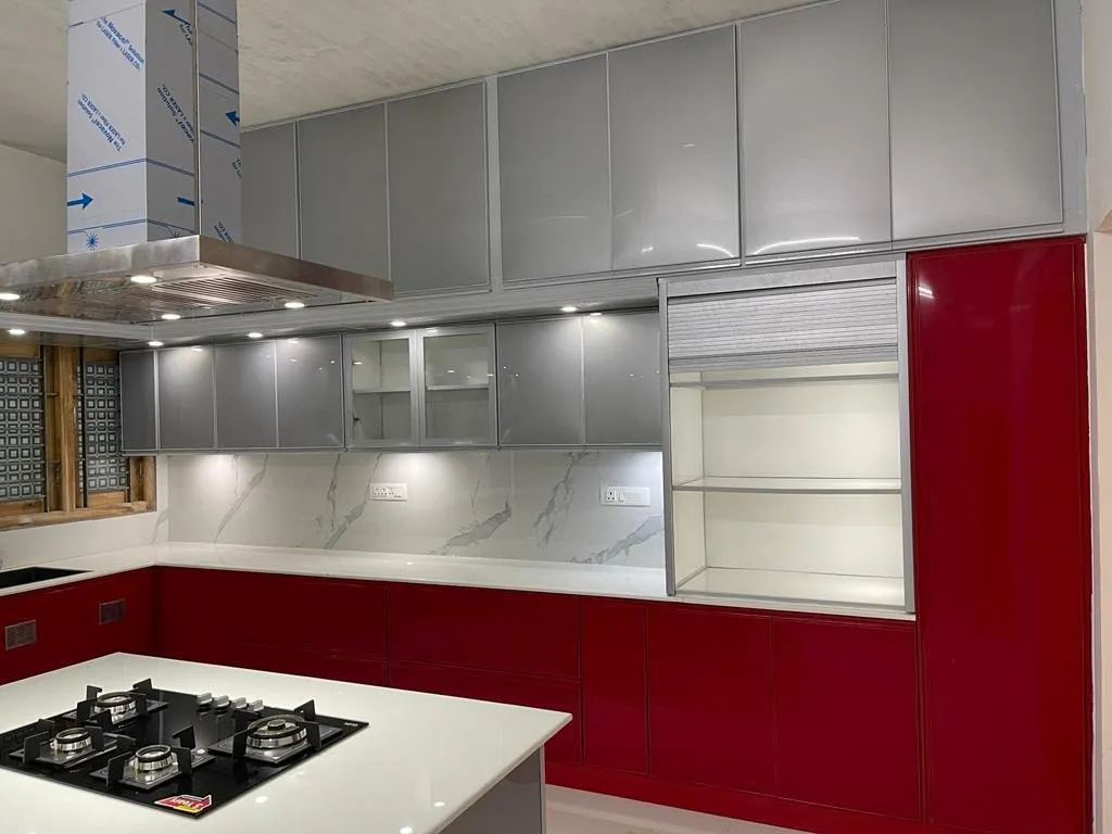 Glossy Red and Grey Modular Kitchen with Marble Finish Backsplash