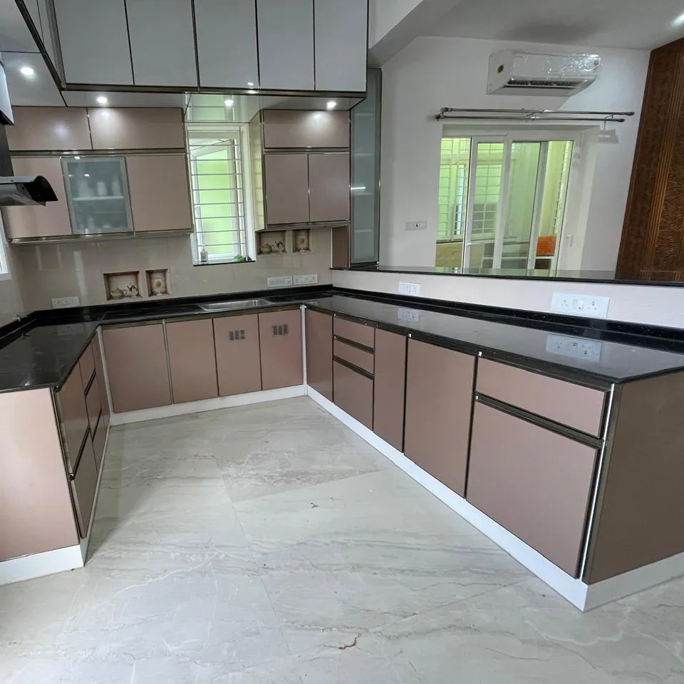 Spacious U Shaped Modular Kitchen with Extended Countertop and Elegant Cabinetry