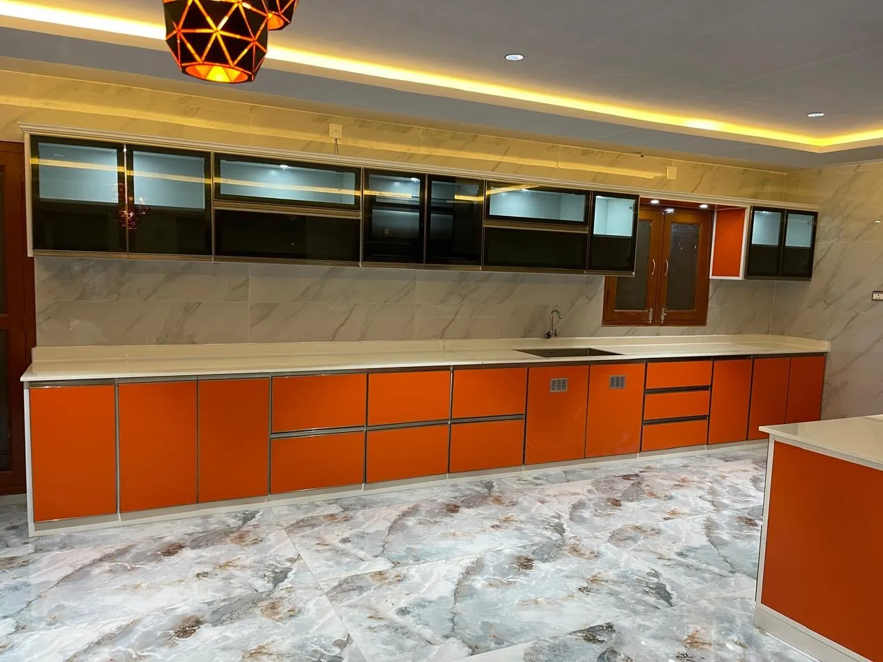 Straight-Line Modular Kitchen with Glossy Orange Finish