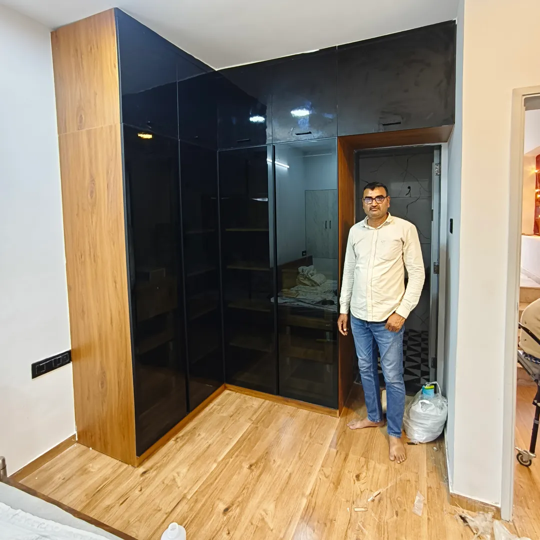 Modern L-Shaped Glass Wardrobe Design in Pune