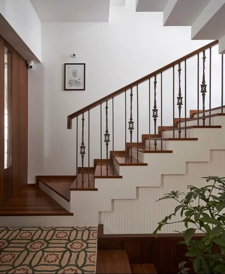 Stylish Patterned Flooring Wooden Staircase With Traditional Metal Railing