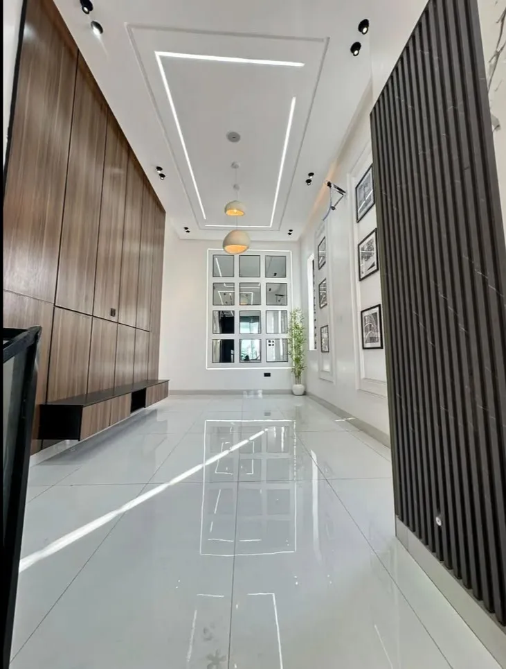 Living Room False Ceiling Design With Wooden Wall Panelling