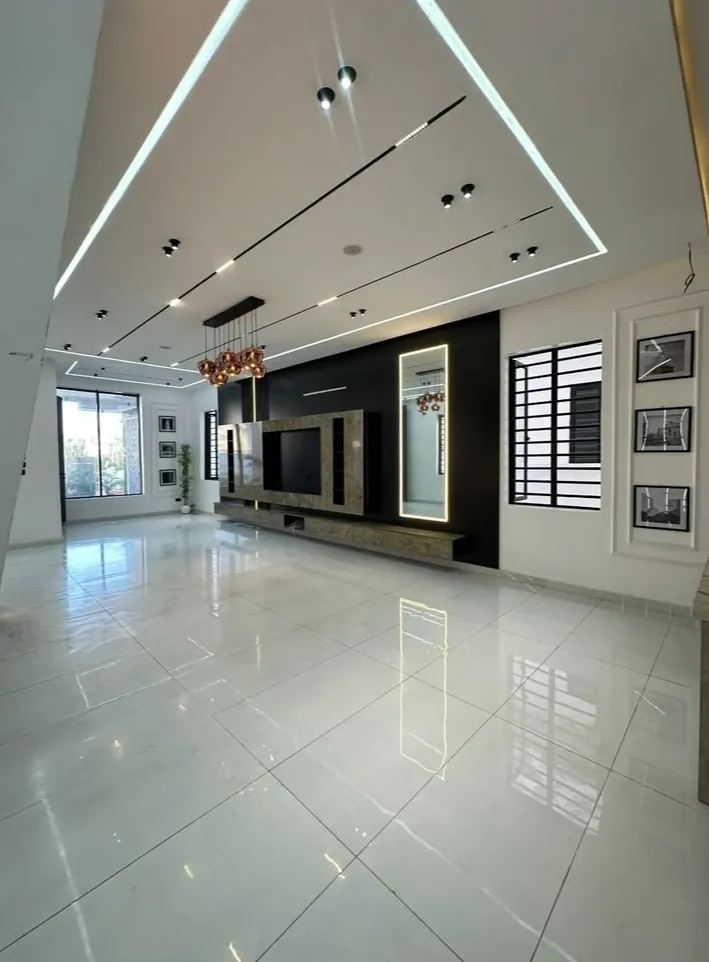 Marble finish TV wall panel false ceiling design