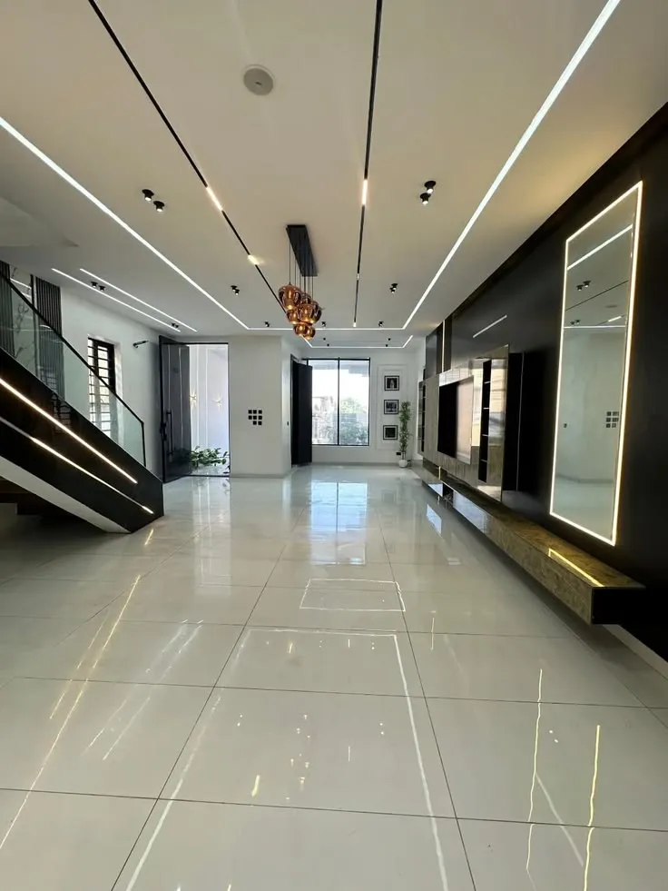 Luxury Living Room With False Ceiling And TV Unit