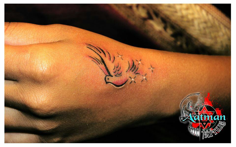 small colour tattoo of a bird on hand bird tattoo indicate the small colour tattoo of a bird on hand bird tattoo indicate the