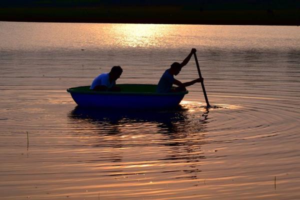Enjoy a peaceful Evening #Coracle Ride on the #backwaters of #Kabini River. Call 9900969005 for bookings.