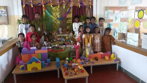 Dasara Celebration at ISE, Bangalore
Bombe Habba, ethnic cloths, sweets, song and dance were the order of the day at ISE. Students enthusiastically contributed to the doll collection and aesthetic display for the Dasara festival. The tiny tots offered panchamrith, the primary made kosambari and the middle school made coconut ladoos as part of their celebrations. Dandia and chanting of slokas set the mood for a beautiful Dasara.
Wishing everyone a Happy Dasara!
