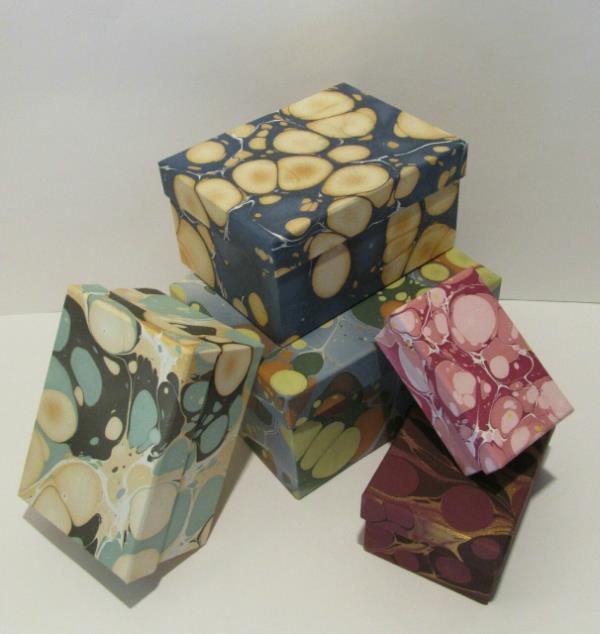 Designer paper gift boxes. We are the manufacturers of different kinds of boxes madeup of attractive handmade papers. We customize different boxes for different occasions like wedding boxes, return gift boxes, corporate gifting etc. All oyr boxes are made with go green concept totally eco friendly.