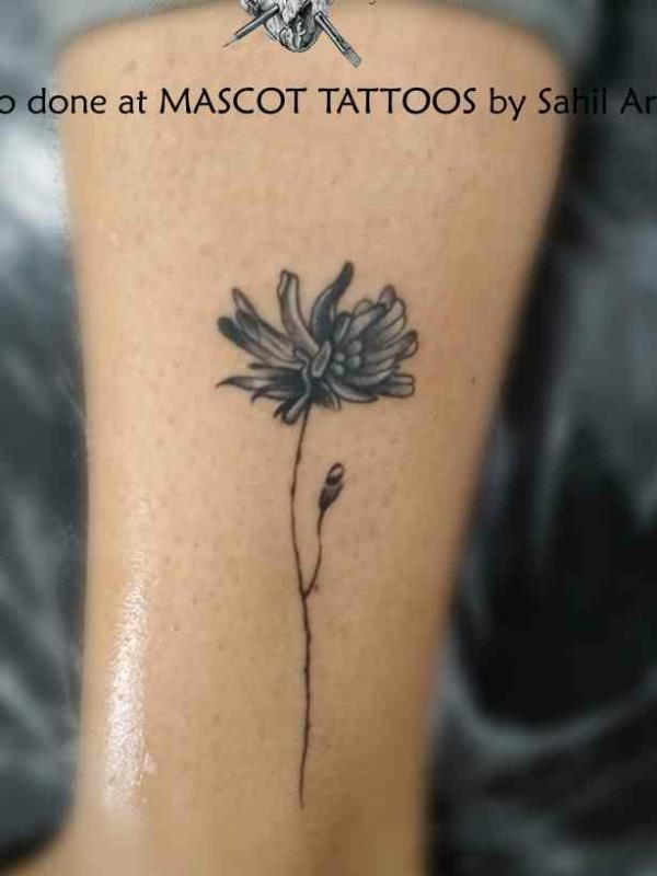 Flower tattoo done on ankle by the only 