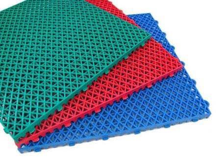 We are pioneers of these floor tiles in India. PP Tiles or Poly propylene Modular tiles are extremely attractive, durable, easy to maintain, assemble and dismantle. These floor tiles are interlockable.
They are available with us in varied colours. Affable on the joints and can be used for all Multi purpose outdoor facilities. Recommended areas of use are tennis courts, basketball courts, badminton, Futsal.