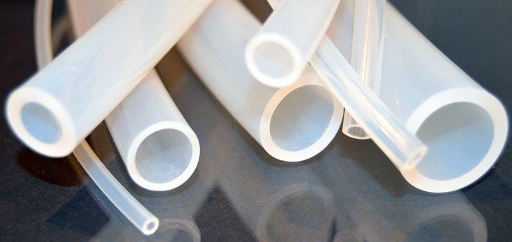 Platinum Cured Silicone Tubing For critical pharmaceutical, biomedical, cosmetic, and food applications Being manufactured in our Platinum cured silicone gives you a number of advantages over conventional Peroxide cured silicones. We propose a wide range of Platinum Silicone Tubing for pharmaceutical and biotech companies. Platinum Cured silicone tubing offers many benefits over traditional peroxide cured tubing. Platinum Tubing offers extremely high purity and very low leaching of bi-products. Due to the platinum catalyst curing system the crosslink density of the silicone polymer is altered which in turn offers enhanced physical properties along with ultra-smooth surfaces, particularly useful in the bioprocess industry sector where reduced bacterial growth is an added benefit. Platinum addition silicone tubing contains no phthalate plasticizers associated with other types of tubing and is manufactured totally free from animal derived components. Our range of silicone tubing is biocompatible to the ISO 10993 standard and meets fully USP Class VI, FDA and European Pharmacopoeia criteria. Peroxide Cured Tube:- Initially popular as a low cost alternative to platinum cured tube, the use of peroxide tubing in biopharmaceutical industry has largely been phased out due to the presence of toxic by-products formed during the curing process of this material. Typical by -products found in peroxide (2,4-dichlorobenzoyl peroxide) cured tube include: - 2,4-dichlorobenzoic acid dichlorobenzoic acid - dichlorobenzoic acid methyl ester dichlorobenzoyl chloride - dichlorobenzaldehyde trichlorobenzene - chlorinated aliphatics polychlorinated biphenyls (PCBs) - phenol, benzyl alcohol - dichlorobenzene, dichlorophenol Washing of peroxide cured tube with pure water (WFI) to remove these contaminants is largely ineffective as these and other by products continually leach from the silicone rubber matrix, concentrating at the tube surfaces, a process that is exacerbated by autoclaving. Platinum Cured Tube:- Platinum-catalysed addition curing is a faster process than peroxide curing which involves just one controlled reaction and which produces no undesirable by-products. For this reason platinum cured silicone tube is now the tube of choice for biopharmaceutical applications. Care should however still be taken in the selection of your source of platinum tube, as only tube that has been manufactured in a completely dedicated Production facility using dedicated extrusion equipment and curing ovens etc, will be completely free of the peroxide decomposition derivatives from the peroxide curing process. Features:- · Excellent biocompatibility; no leachable additives, DOP, or plasticizers; odorless and nontoxic, fungus resistant. · No taste imparted to transported fluids. Resistant to oxidation, corona, ozone and radiation Does not support bacterial growth Withstands repeated sterilization Non-reactive to body tissue and fluid Non-adherence tissue Retains physical properties in extreme conditions Non Toxic Non Yellowing No peroxide by-products High tear strength as standard High gloss finish Excellent quality Highly hydrophobic Extended life in Peristaltic pumps · Extremely good at low temperatures. Limitations:- · Do not use with concentrated solvents, oils, or acids. · Relatively high gas permeability. · Physical Characteristics and Composition: · Thermal set rubber. · Siloxane polymers and amorphous silica. · Excellent compression strength. · Soft material. · Translucent, clear to light amber. Temperature Range:- -60 to 460°F (-51 to 232°C) Classifications & Certifications:- · DMF No-29761 from US FDA · FDA 21 CFR 177.2600 · USP Class VI · German BFR xv · TSE/BSE · RoHS · France Arrete du 25 · ISO 10993 Cleaning/Sterilization:- · Clean with hot water/soap solution. · Use nonoily soap such as IVORY. · Do not use synthetic detergents or oil-based soaps as they may be absorbed by the tubing and subsequently leach out into the fluid. · Rinse thoroughly with distilled water. · By Sterilization method · Ethylene oxide (ETO) sterilization is not recommended. Sufficient data are not available regarding complete outgassing of residual ETO and ETO byproducts.