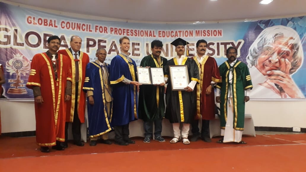 Happy to receive the Doctorate