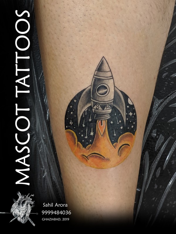Rocket Tattoo with space theme done at t
