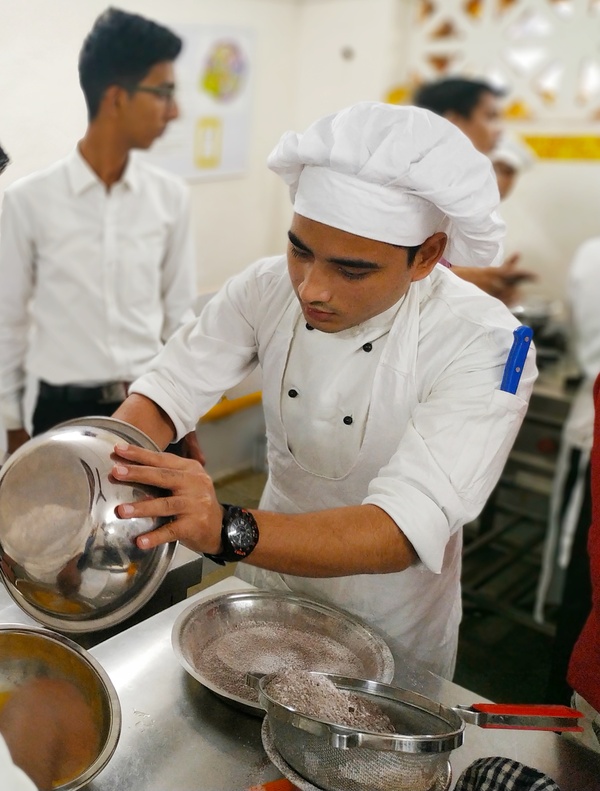 HM College facilitating B