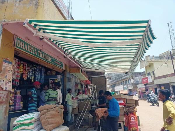 Awning install at cotton marke