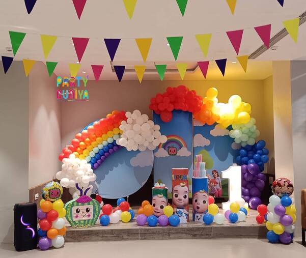 Rainbow with coco melon pinata