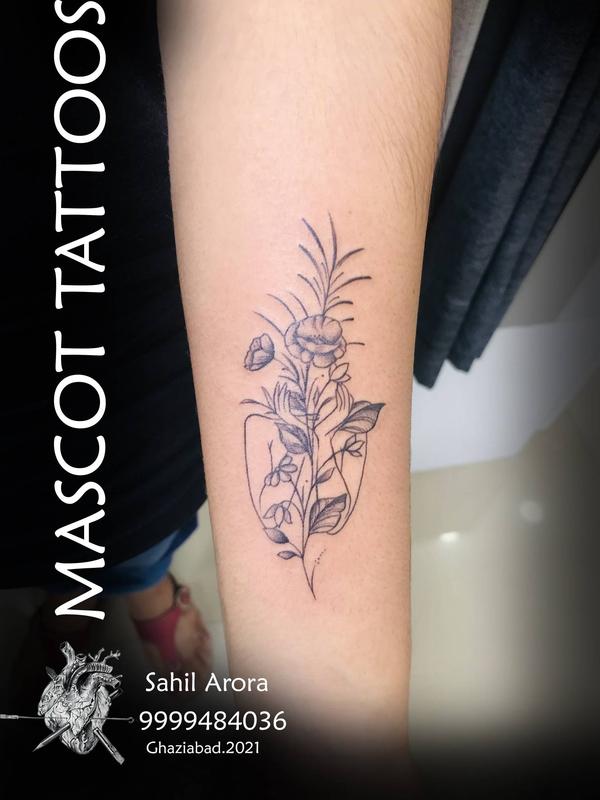 Self love Tattoo. Girl leaf design done 