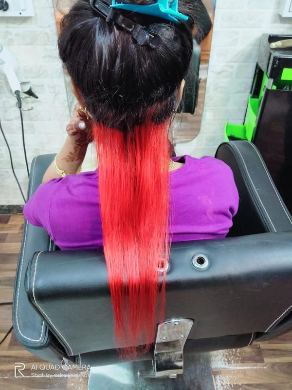 red hair colour done by us from Sameera'