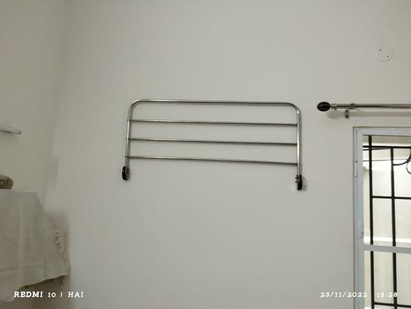 wall folding dress rack in coi