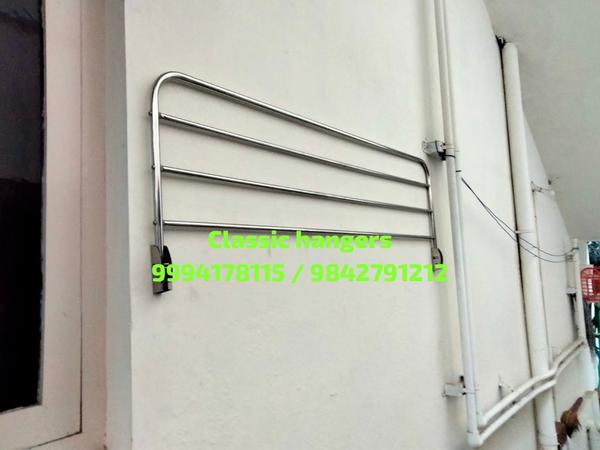 wall folding dress rack in coi