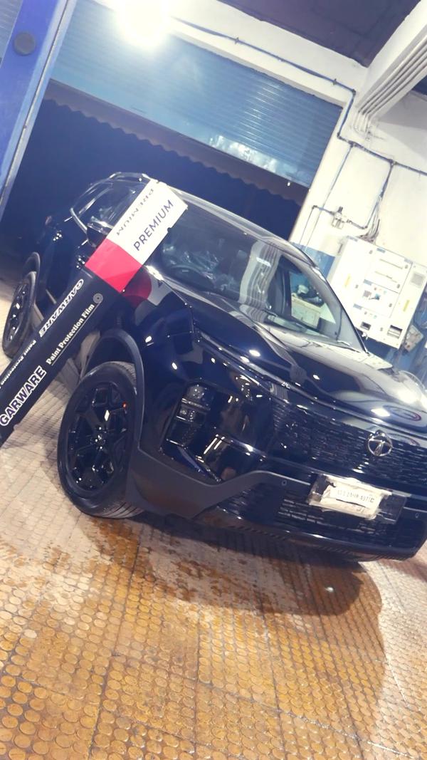 sleek black tata safari
