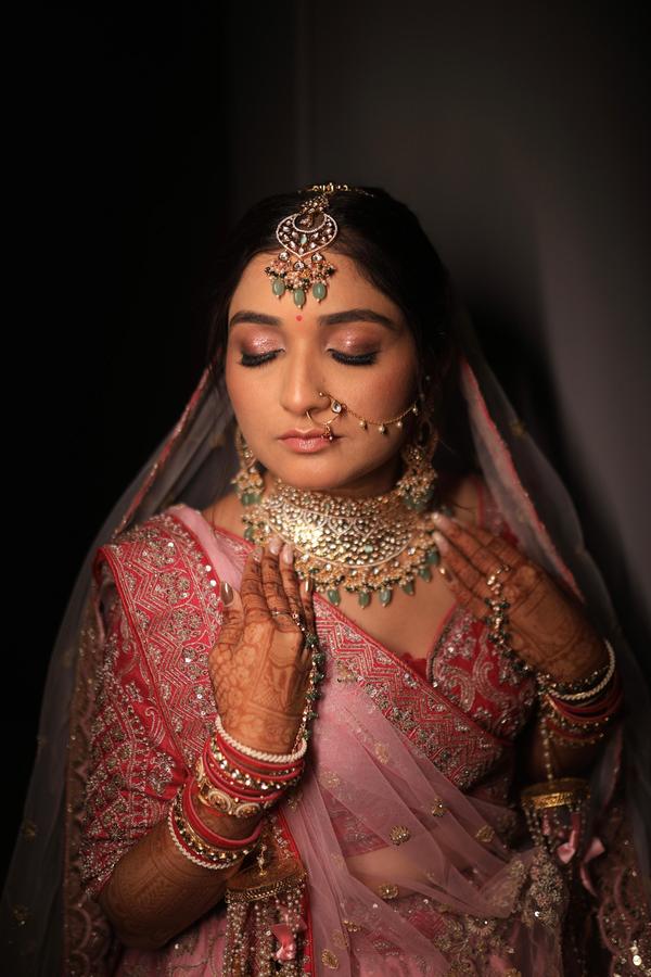 Soft nude pink makeup with the hint of g