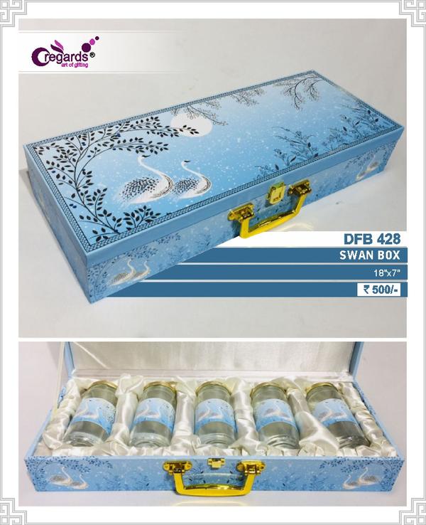 four elegant glass bottles