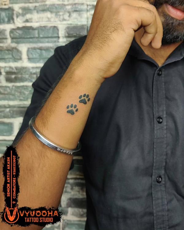 dog and cat paw tattoos