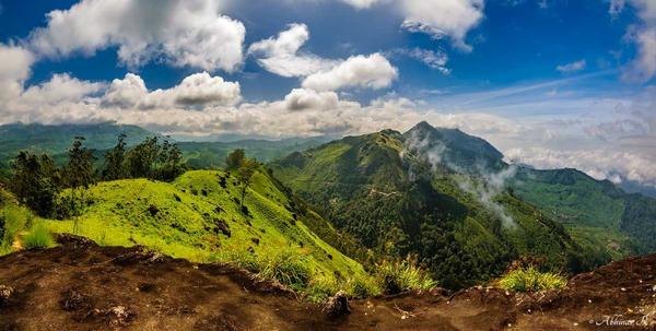 surrounding lush valleys