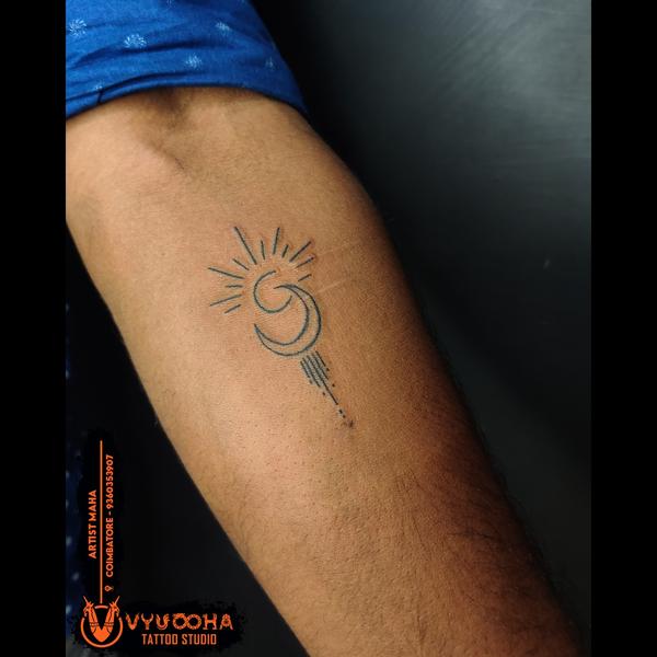 minimalist cosmic tattoo