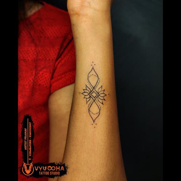geometric lotus tattoo coimbat