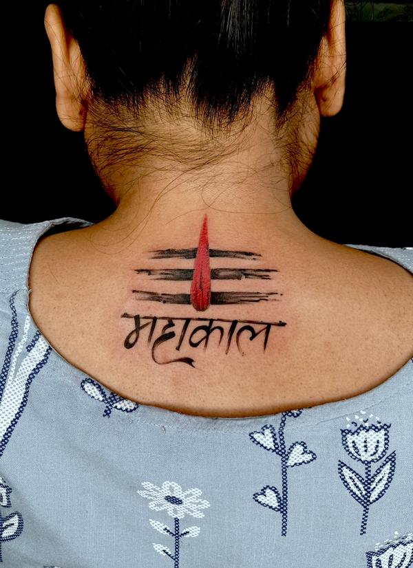 intricately designed trishul