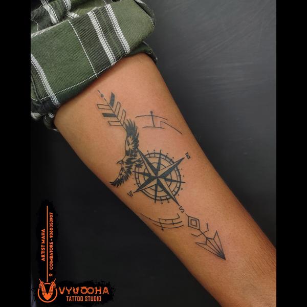 spiritual bird and star tattoo