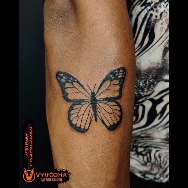 small butterfly tattoo design