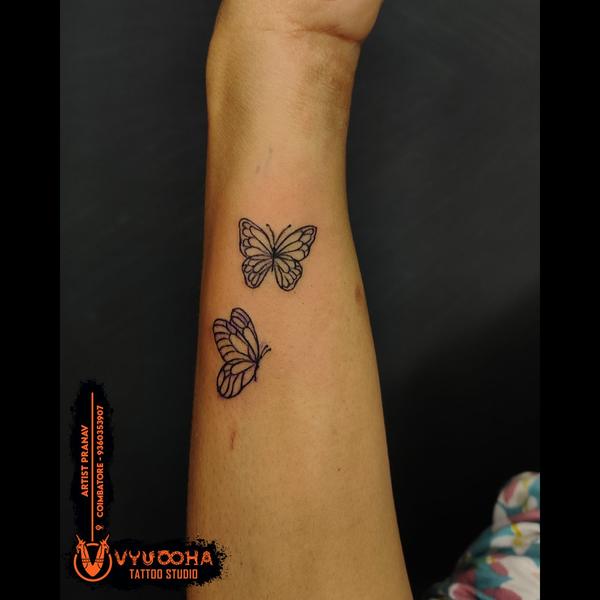 forearm tattoo symbolizing tra