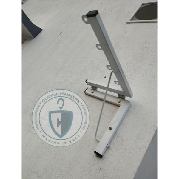 wall folding clothes rack tiru