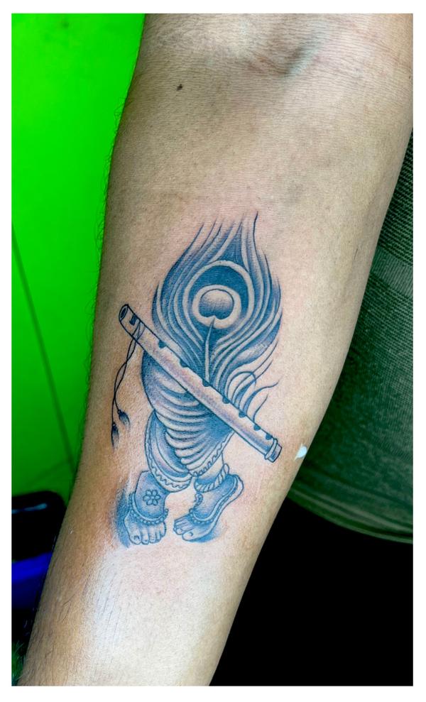 fine line feather tattoo