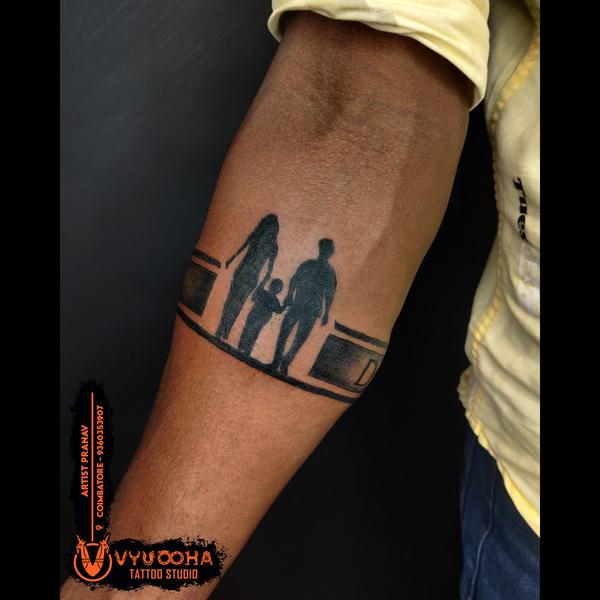 parent child silhouette tattoo