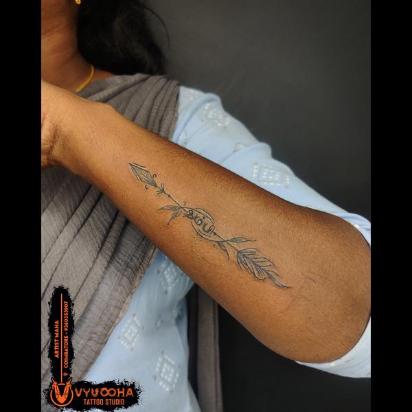 elegant arrow tattoo design