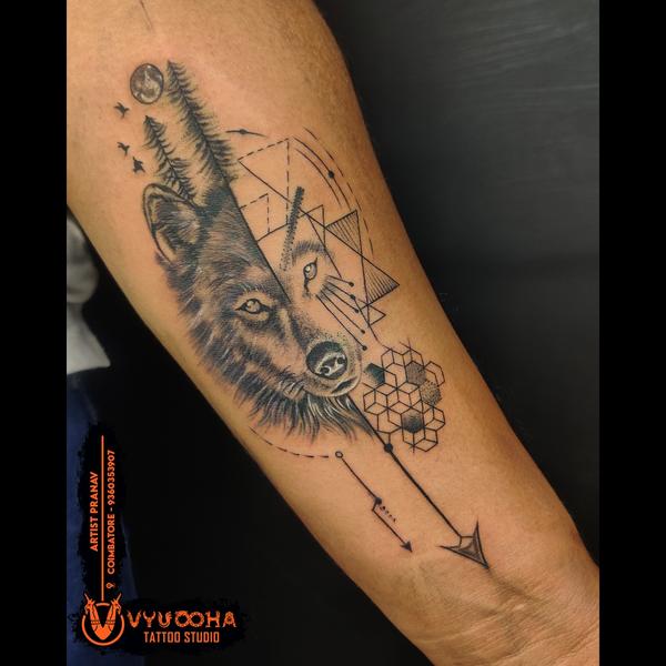 geometric wolf tattoo coimbato