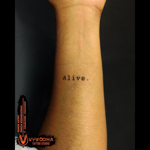 minimalist alive word tattoo c